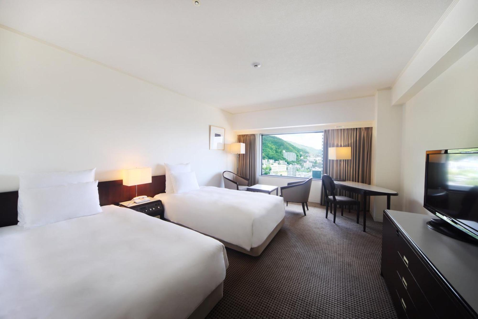 Ana Crowne Plaza Kobe By Ihg Hotel Buitenkant foto A room at the hotel